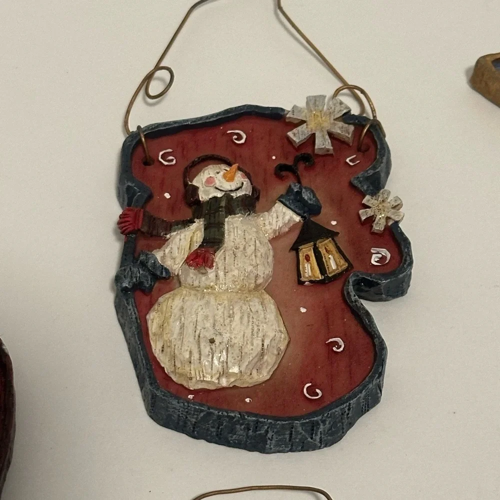A Collection of 5 Snowman Christmas Tree Ornaments